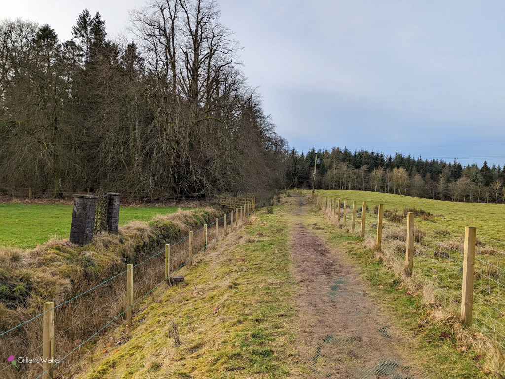 Path along grassy embankment beside Craufurdland Castle