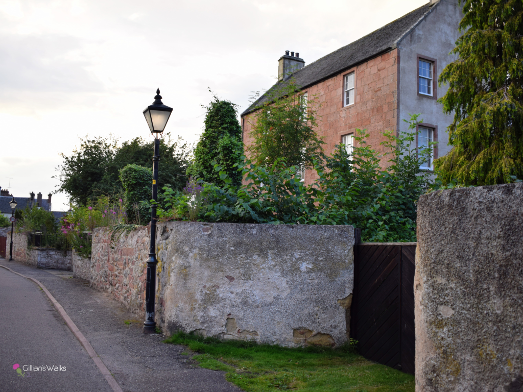 A street in Cromarty with old fashioned lamp posts