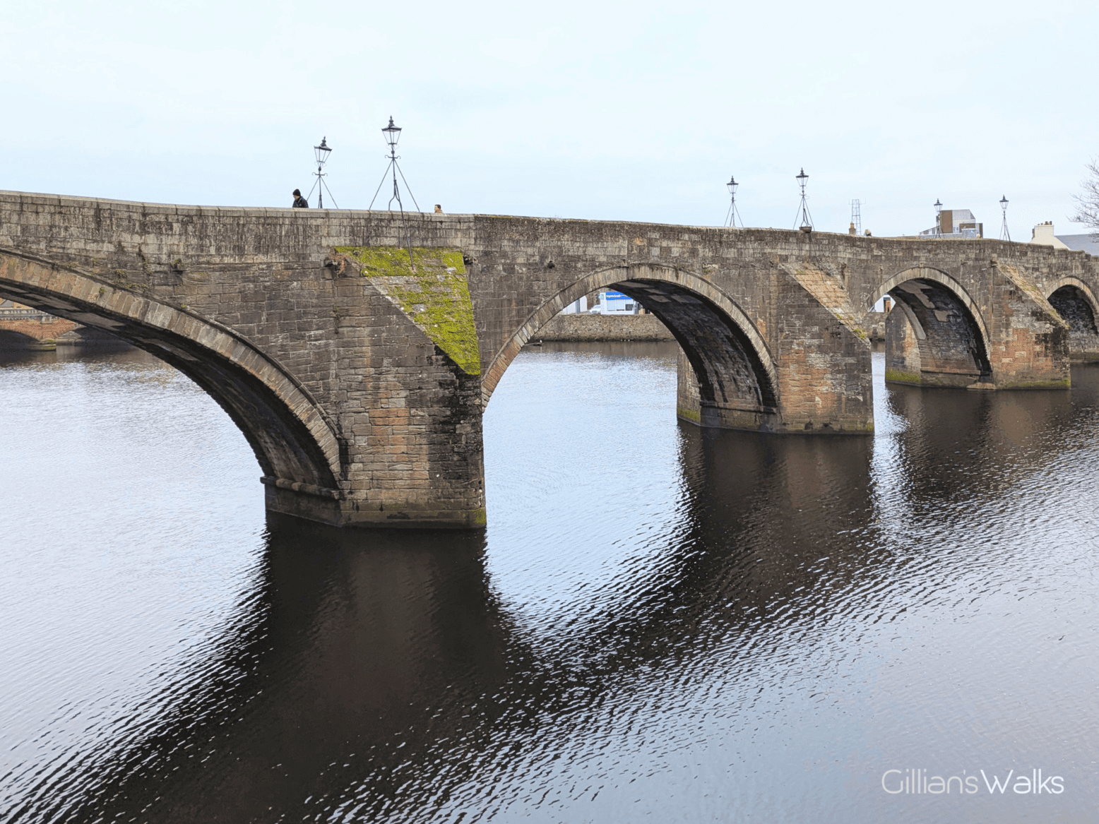 Old stone 4-arch bridge spanning the River Ayr