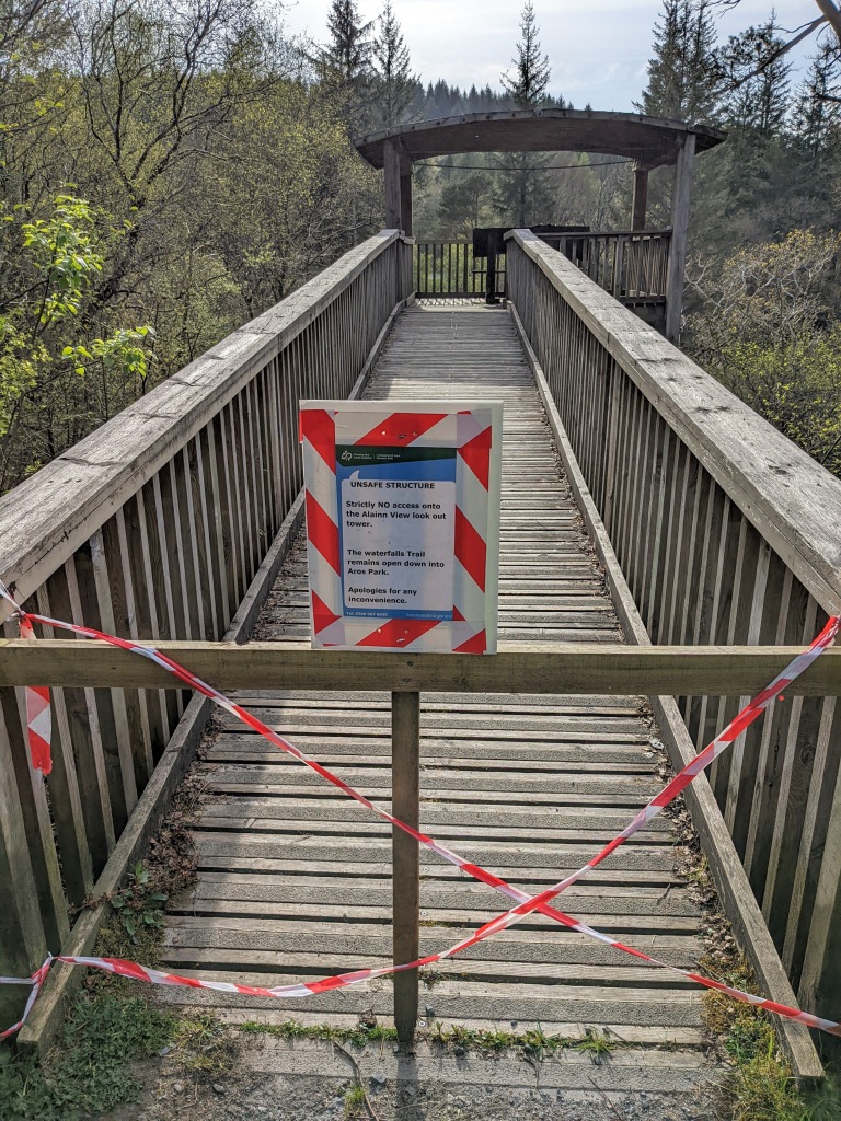 Wooden bridge with closure notice