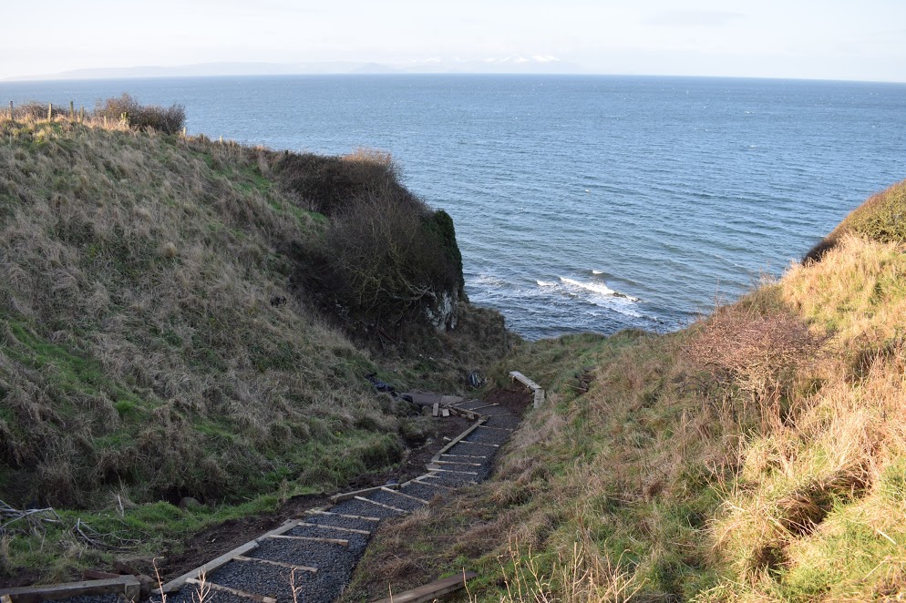 Steep gully steps which lead down to the Firth of Clyde on the Ayrshire Coastal Path at Fisherton. 