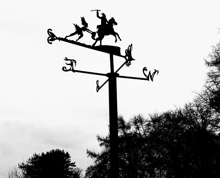 Weather vane on the Poet's path, Alloway depicting a scene from the poem Tam o Shanter