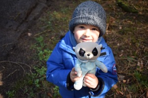 My four-year old son holding his teddy