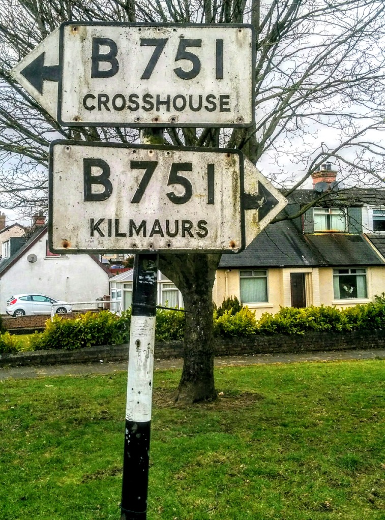 old fashioned road sign for Crosshouse and Kilmaurs