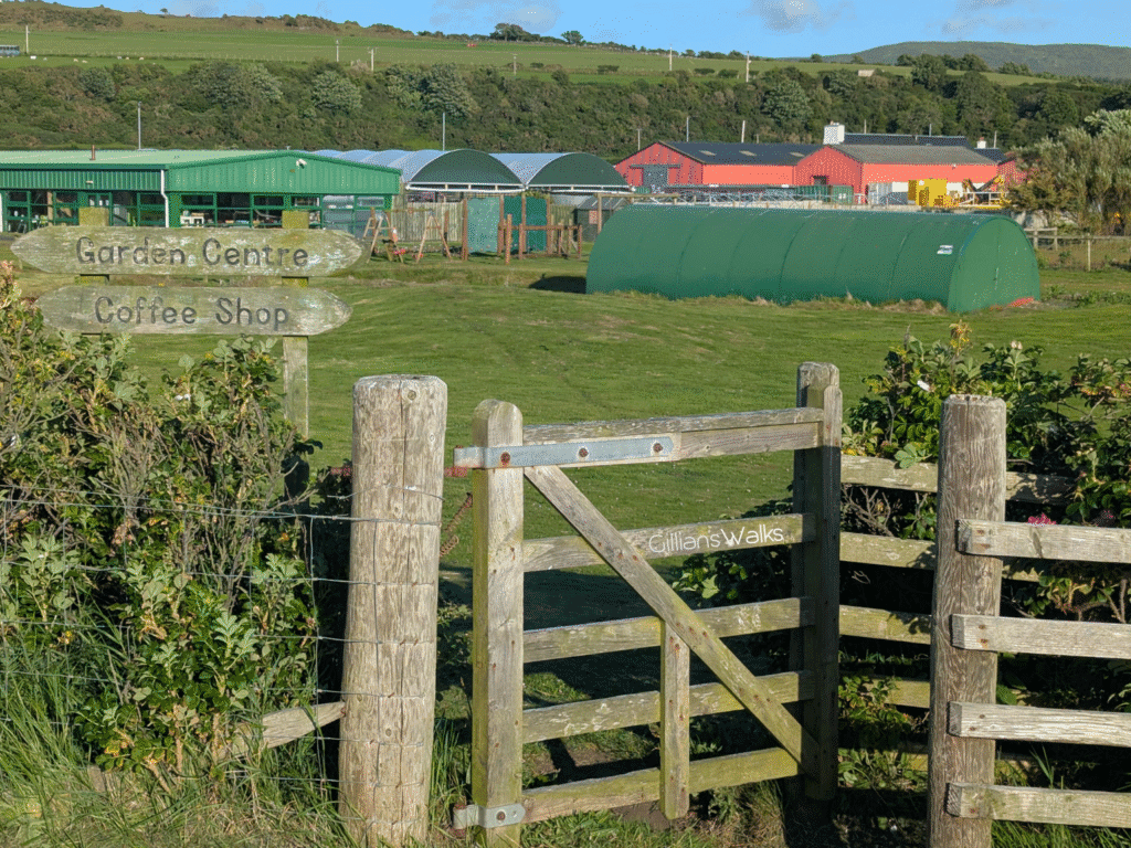 Wooden kissing gate leading into Craigiemains Garden Centre