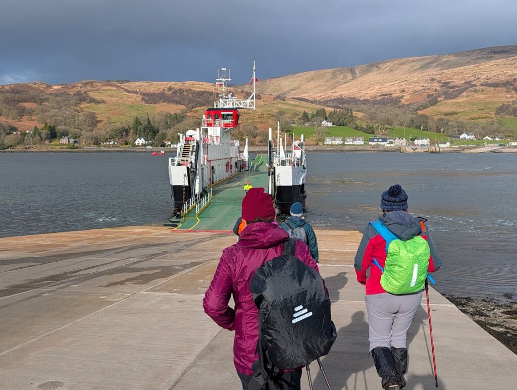 Several of our group walking down the slip towards the awaiting Rhobodach to Collintraive Cal Mac ferry