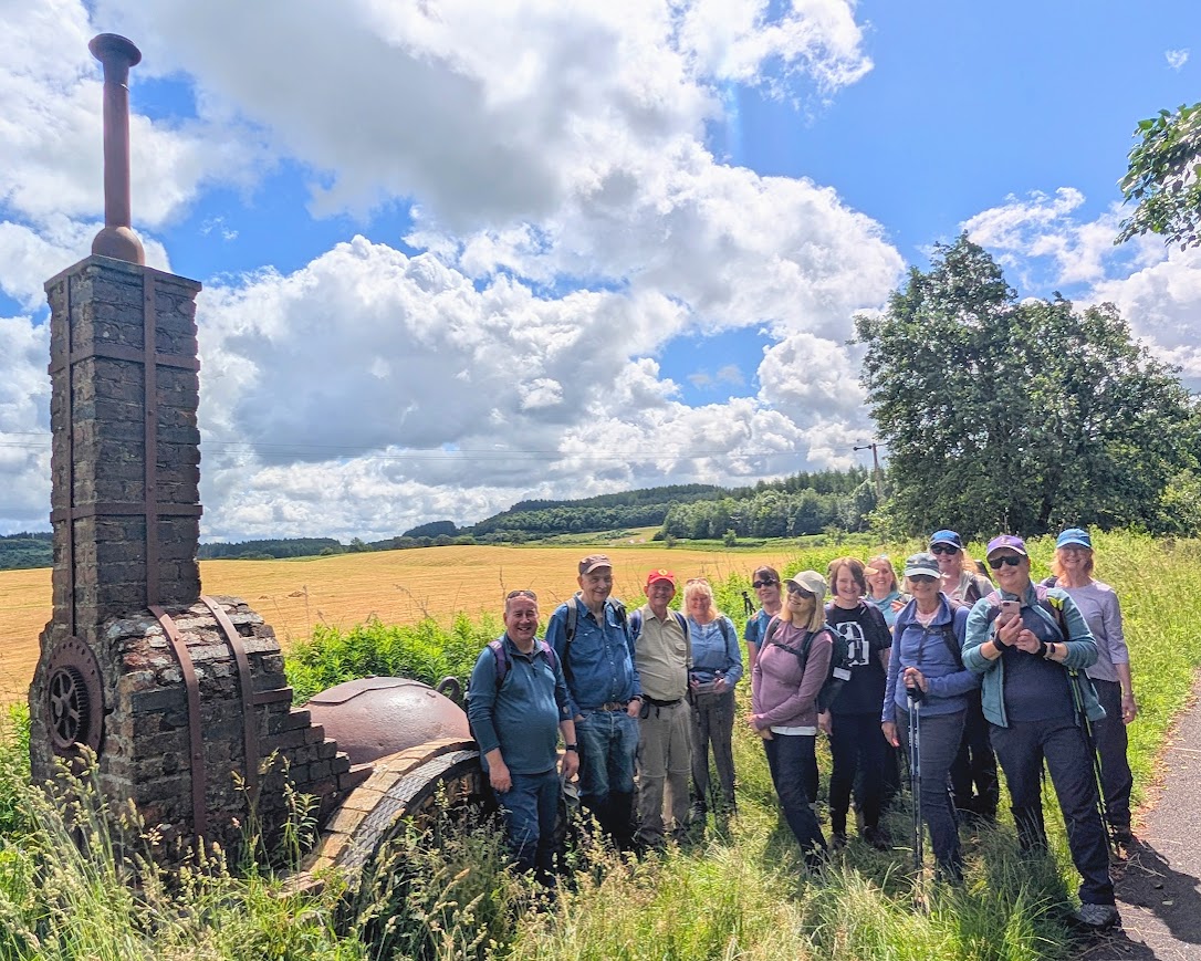 Our group posing beside an art installation on the cycle track, designed in the shape of a train