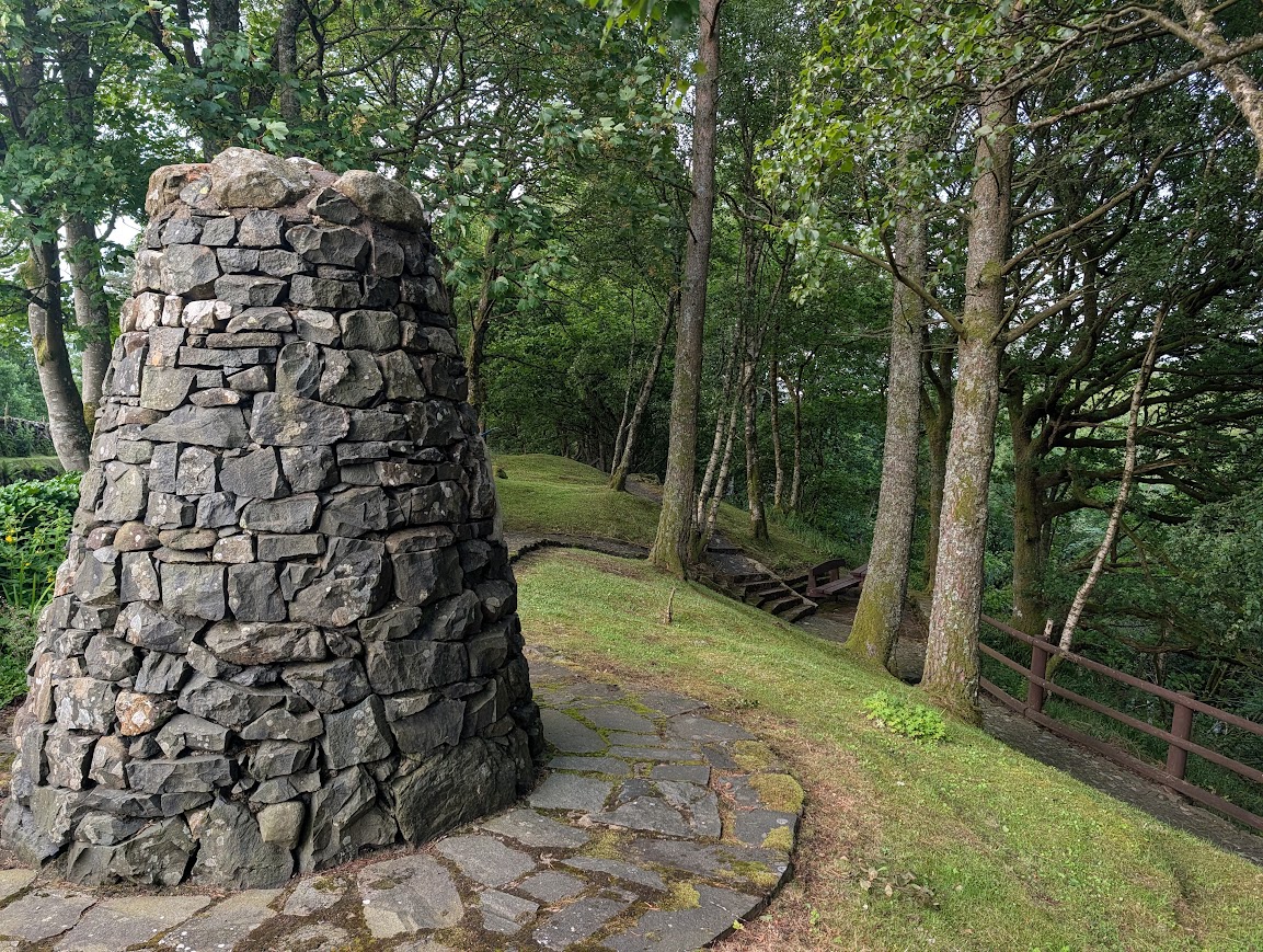 Burns memorial stone cairn and well-kept gardens