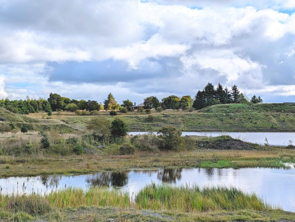 Looking across the loch towards the old Darnconner schoolhouse - a red sandstone building