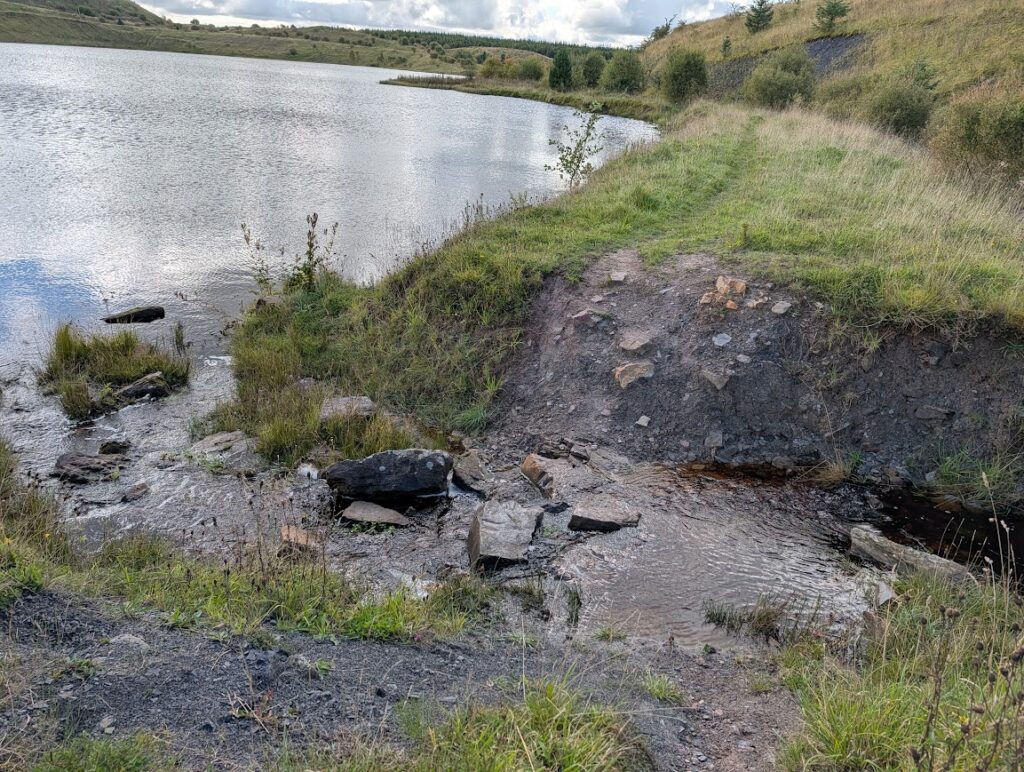 Small ford at the edge of the loch which has some rough natural stepping stones to assist walkers across